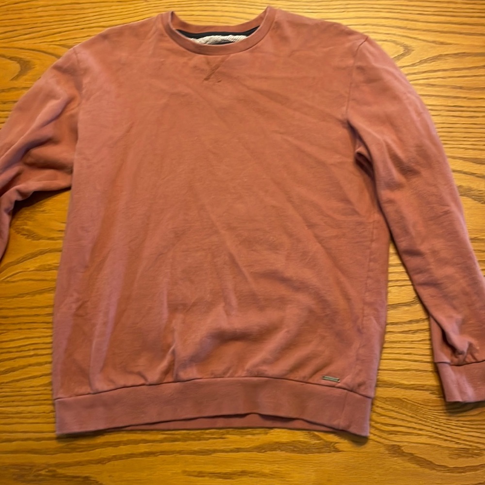 Denim and Flower salmon colored sweater.